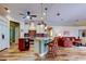 Open concept kitchen with a center island, pendant lighting, and modern appliances at 15302 Lake Maurine Dr, Odessa, FL 33556