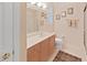 Modern bathroom with sleek vanity, toilet, and glass-enclosed shower at 16343 Burniston Dr, Tampa, FL 33647