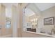 Bright bathroom showcasing a walk-in shower and vanity with sleek design and natural light at 16343 Burniston Dr, Tampa, FL 33647