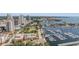 Picturesque aerial view of a marina filled with boats, set against a city backdrop and waterfront at 199 Dali Blvd # 403, St Petersburg, FL 33701