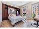 Cozy bedroom with built-in storage, large windows providing natural light, and stylish tile flooring at 199 Dali Blvd # 403, St Petersburg, FL 33701