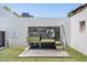 Dog park features a convenient washing station with an elevated sink and a turf-covered step at 199 Dali Blvd # 403, St Petersburg, FL 33701