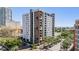Modern building with balconies, street view, and a blend of white and brown facade accents at 199 Dali Blvd # 403, St Petersburg, FL 33701
