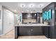 Bright kitchen with granite countertops, stainless appliances, and attractive pendant lighting at 199 Dali Blvd # 403, St Petersburg, FL 33701