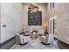 Spacious condo lobby area with comfortable seating and a modern artistic lighting feature at 199 Dali Blvd # 403, St Petersburg, FL 33701