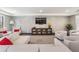 Resident lounge with contemporary seating, television, and access to shared amenities at 199 Dali Blvd # 403, St Petersburg, FL 33701