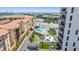 This aerial view highlights the building's rooftop pool with lounge and recreation area at 199 Dali Blvd # 403, St Petersburg, FL 33701