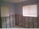 Bedroom with two windows at 212 Driftwood Pl, Palm Harbor, FL 34683