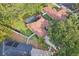 Aerial view of home with a pool and backyard, highlighting its layout and neighborhood setting at 2222 Longmore Cir, Valrico, FL 33596