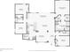 Detailed floor plan showcasing the layout of the home, including the kitchen, bedrooms, and bathrooms at 2222 Longmore Cir, Valrico, FL 33596