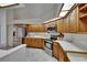 Spacious kitchen featuring stainless steel appliances, ample counter space, and light-colored cabinets at 2413 Buckhorn Run Dr, Valrico, FL 33596