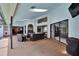Outdoor patio featuring ample seating, a tv, and skylights at 2413 Buckhorn Run Dr, Valrico, FL 33596