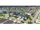 Community aerial shot featuring attractive homes, tree-lined streets, and a beautiful lake at 34266 Radley Way, Wesley Chapel, FL 33545