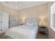Inviting bedroom with a neutral palette, featuring stylish furnishings and natural light at 4139 Rocky Shores Dr, Tampa, FL 33634