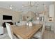 Open concept living and dining area with a view of the kitchen, perfect for modern living at 4139 Rocky Shores Dr, Tampa, FL 33634