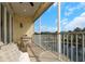 Relaxing screened patio featuring comfortable seating and a serene view of the lake at 4139 Rocky Shores Dr, Tampa, FL 33634