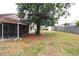 Expansive backyard featuring mature tree that offers substantial shade at 4214 Longfellow Dr, Plant City, FL 33566