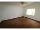Simple bedroom with light-filled window and ceiling fan to stay cool at 4214 Longfellow Dr, Plant City, FL 33566