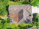 An aerial view of the roof and screened-in lanai at 4227 Sandy Shores Dr, Lutz, FL 33558