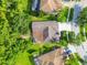 An aerial view of the roof and screened-in lanai at 4227 Sandy Shores Dr, Lutz, FL 33558