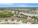 Aerial view of a Primary-planned community with lakes and well-manicured landscaping at 4329 Barletta Ct, Wesley Chapel, FL 33543