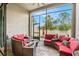Relaxing screened patio with ample seating for outdoor enjoyment at 4329 Barletta Ct, Wesley Chapel, FL 33543