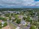 Aerial view of the home surrounded by lush trees and other properties in the neighborhood at 4727 17Th S Ave, St Petersburg, FL 33711
