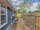 Home exterior along fenced yard at 4727 17Th S Ave, St Petersburg, FL 33711