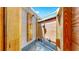 A private outdoor shower with wood accents, attached to the home's exterior, offering convenience and a spa-like experience at 4735 W Oklahoma Ave, Tampa, FL 33616