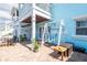 Back patio with brick pavers, relaxing hammocks, and outdoor seating at 5075 Starfish Se Dr # A, St Petersburg, FL 33705