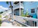 Back patio with brick pavers, cozy hammocks, and outdoor seating at 5075 Starfish Se Dr # A, St Petersburg, FL 33705
