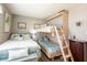 Charming bedroom featuring a unique bunk bed design, maximizing space and comfort at 5075 Starfish Se Dr # A, St Petersburg, FL 33705