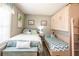 Charming bedroom featuring a unique bunk bed design, maximizing space and comfort at 5075 Starfish Se Dr # A, St Petersburg, FL 33705