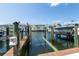 Boat lift with waterfront view and access to boat dock at 5075 Starfish Se Dr # A, St Petersburg, FL 33705
