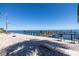 Community dock with views of the water and nearby seating areas at 5075 Starfish Se Dr # A, St Petersburg, FL 33705