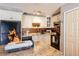 Updated kitchen featuring granite counters, updated white cabinetry and modern appliances at 5075 Starfish Se Dr # A, St Petersburg, FL 33705