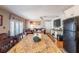 Spacious, open-concept layout from kitchen island to bright living area with hardwood floors at 5075 Starfish Se Dr # A, St Petersburg, FL 33705