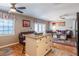 Open-concept living area features wood floors and plenty of light at 5075 Starfish Se Dr # A, St Petersburg, FL 33705