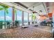 An expansive outdoor patio with ample seating, overlooking the water and boat dock at 5075 Starfish Se Dr # A, St Petersburg, FL 33705