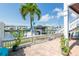 Private patio with waterfront views, brick pavers, and access to boat slip at 5075 Starfish Se Dr # A, St Petersburg, FL 33705
