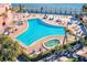 Overhead view of the large swimming pool and separate hot tub on the community property at 5075 Starfish Se Dr # A, St Petersburg, FL 33705
