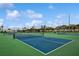 Community tennis courts featuring well-maintained greenspace and landscaping at 5075 Starfish Se Dr # A, St Petersburg, FL 33705