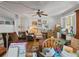 Bright living room features built-in bookshelves and neutral walls at 544 80Th N Ave, St Petersburg, FL 33702