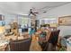 Cozy living room with built-in shelving, hardwood floors, and abundant natural light at 544 80Th N Ave, St Petersburg, FL 33702