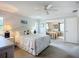Spacious bedroom showing an en suite with two twin beds and coastal themed accents at 5456 Fairway Bend Dr, Sarasota, FL 34243