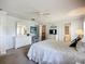 Large main bedroom features white furnishings, closet and bathroom access, and ample light at 5456 Fairway Bend Dr, Sarasota, FL 34243