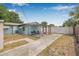 Spacious backyard with screened patio, seating, and storage shed, ideal for relaxing and entertaining outdoors at 5734 20Th N Ave, St Petersburg, FL 33710