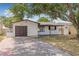 Charming single-story home with a well-maintained front yard and a one-car garage at 5734 20Th N Ave, St Petersburg, FL 33710