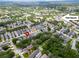 An aerial view of the community showing lush landscaping and proximity to Park Square at 5914 Goldenbark Pl, Lithia, FL 33547