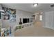 Upstairs bonus room with play area and shelving for collectibles; carpet flooring at 5914 Goldenbark Pl, Lithia, FL 33547
